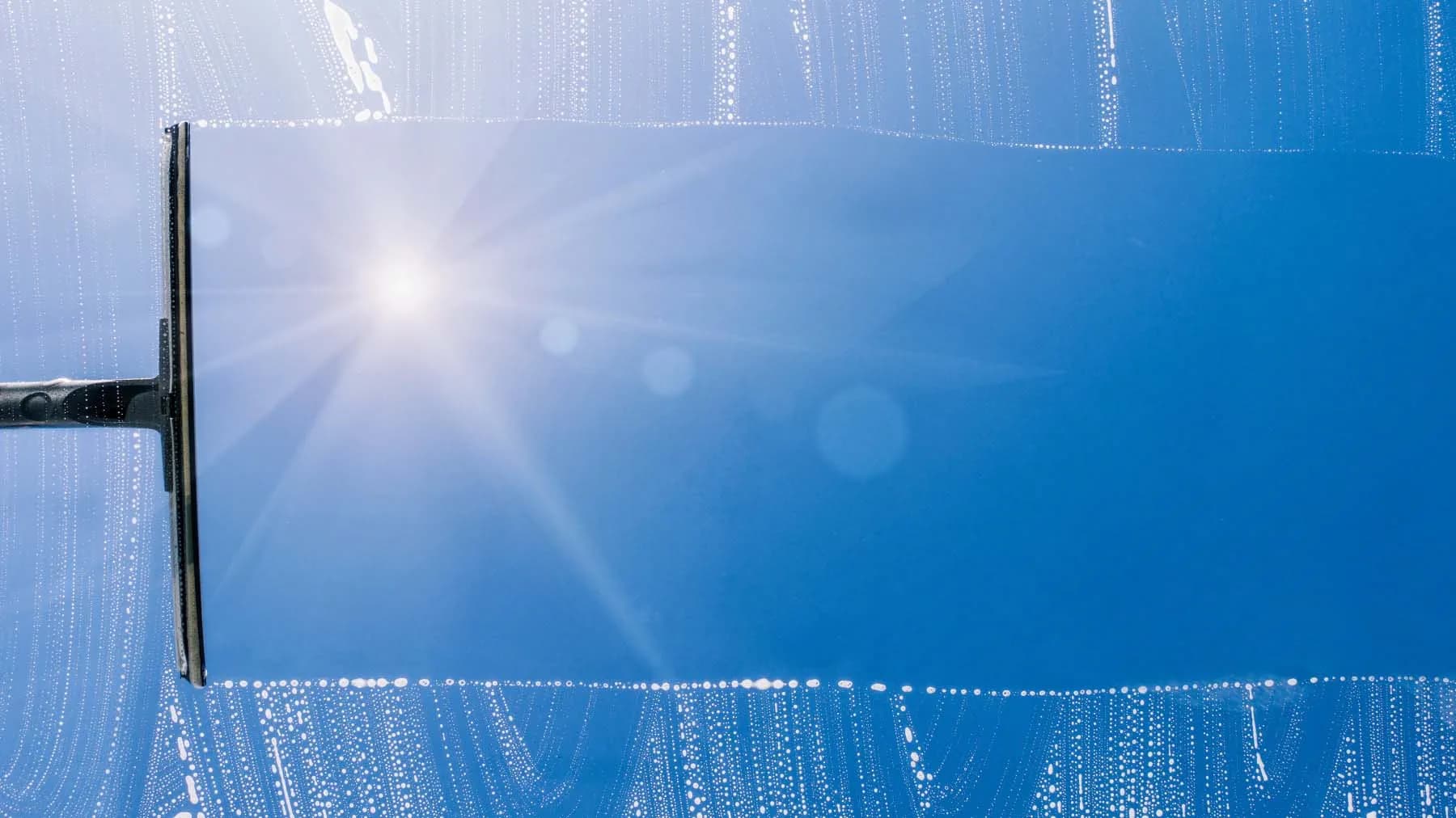 Window washing service leaving glass streak free